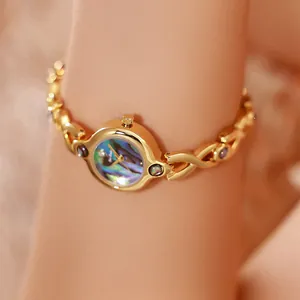 Reloj de pulsera vintage de oro para mujer con esfera de nácar de abulón natural de colores
