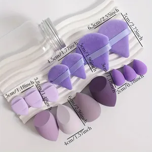 Detailed size overview of various purple makeup blenders and powder puffs with storage jar