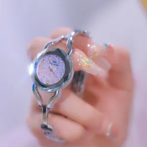 Elegant women's watch with dreamy purple glitter dial and faceted glass silver bracelet