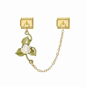 Detail of gold Italian charm link with white rose pendant and connecting chain