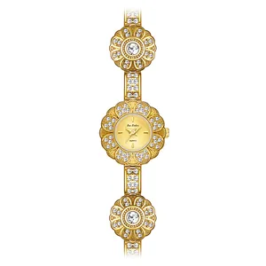 Elegant gold floral bracelet watch for women with sparkling crystal embellishments
