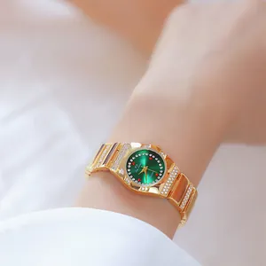 Elegante gouden BS Bee Sister dameshorloge met groene wijzerplaat en luxe strass-accenten