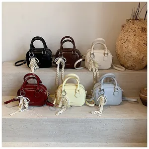 Collection of stylish mini leather crossbody handbags in six colors for daily commute