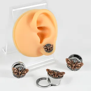 Écarteurs d'oreilles vintage en acier inoxydable avec motif de papillon tête de mort