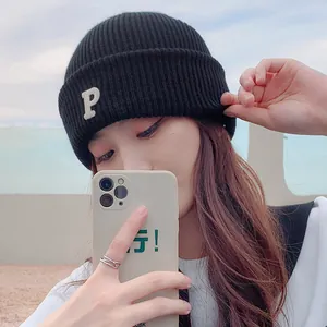Stylish black knitted beanie with letter P embroidery, perfect winter hip-hop fashion hat