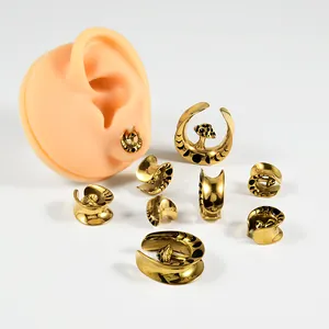Gold stainless steel U-shaped ear gauges with black mushroom design and crescent moon shape