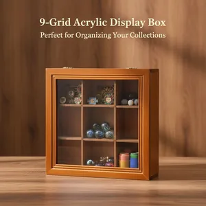 Detailed view of a 9-grid wooden display box with clear lid for organizing small collections