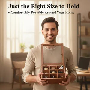 Man holding a vintage wooden nine-compartment storage box with a transparent lid