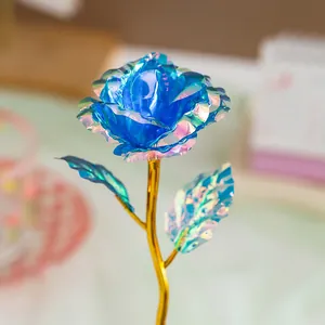 Close-up macro view of a 18cm iridescent blue gold foil rose gift for Valentine's Day decor