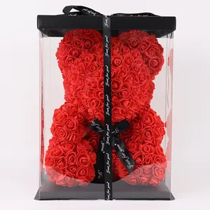 Handmade romantic red rose bear in a luxury transparent gift box with black ribbon