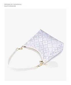 Etnische stijl jacquard geweven patroon schouder onderarm tas met witte lederen band hardware.