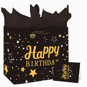 Elegant black birthday gift bag set featuring gold Happy Birthday text and matching card