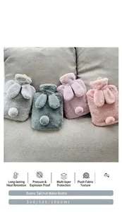 Detail view of plush rabbit ear hot water bags available in four soft pastel colors