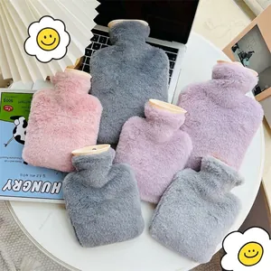Soft faux fur hot water bottles for winter comfort in pink, grey and purple tones