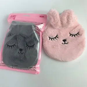 Plush rabbit-shaped hot water bag with soft faux fur cover for cozy winter warmth