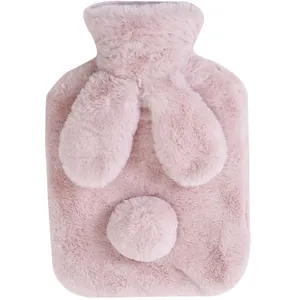 Soft pink faux fur hot water bottle cover with cute bunny ears and tail