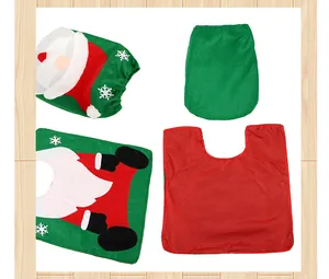 Vista dettagliata del set copriwater natalizio con Babbo Natale e tappetino abbinato.