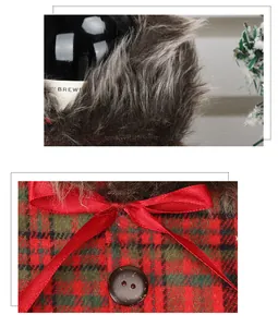 Detail view of plaid Christmas wine bottle cover with red bow and fur trim.