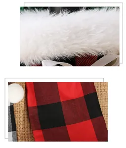 Detailed view of red and black buffalo plaid Christmas wine bottle cover with faux fur trim