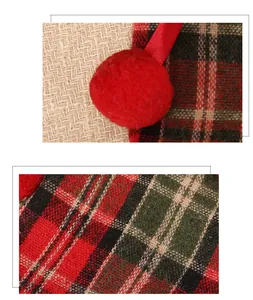 Detailed texture of Christmas plaid wine bottle cover with red pom-pom and ribbon