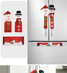Christmas refrigerator handle covers with Santa and Snowman characters on white fridge.