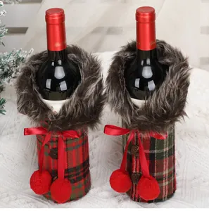 Detail of Christmas plaid wine bottle covers with faux fur collars and red bows