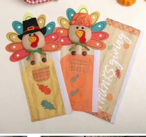 Detailed macro shot showing the festive turkey and pumpkin patterns on Thanksgiving handle covers
