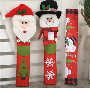 Detail of Christmas refrigerator handle covers with Santa and snowman designs