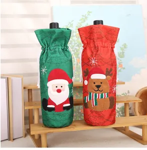 Festive Christmas wine bottle covers featuring Santa Claus and reindeer applique designs.
