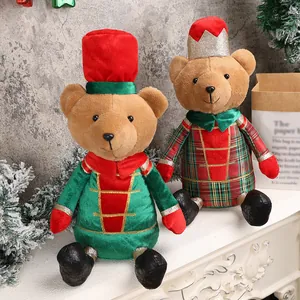 Adorable Christmas plush bear ornaments in festive red and green outfits for home decor