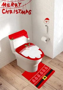 Vue détaillée de l'ensemble 3 pièces couvre-siège de toilette et tapis Père Noël