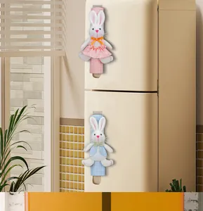 Cute 3D plush rabbit refrigerator handle covers shown in a warm kitchen setting.
