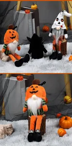Detail view of handmade Halloween gnomes with long legs and pumpkin hats