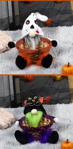 Two Halloween faceless gnome plush baskets featuring ghost and black cat hat designs