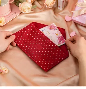 Romantic red felt gift envelope bag with white heart pattern for Valentine's card storage.