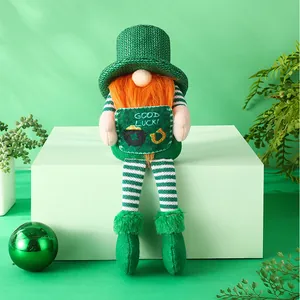 Detailed close-up of a green St. Patrick's Day gnome doll holding a Good Luck sign