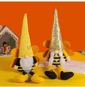 Pair of handcrafted creative bee-themed faceless gnomes for festive spring home decoration