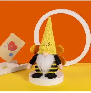Handmade bee festival gnome plush doll ornament with a yellow knitted pointed hat