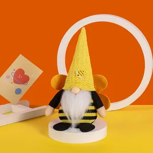Handmade Bee Festival gnome plush doll with yellow knit hat and black striped body
