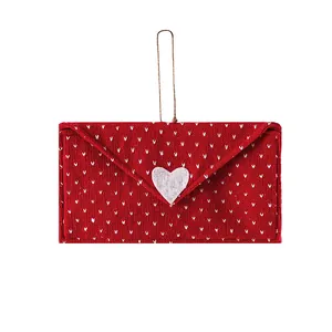 Red knitted Valentine's Day envelope decoration with white heart pattern and loop