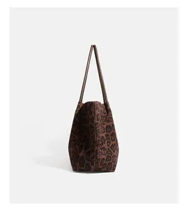 Side profile of a retro leopard print suede tote bag with large capacity for daily use