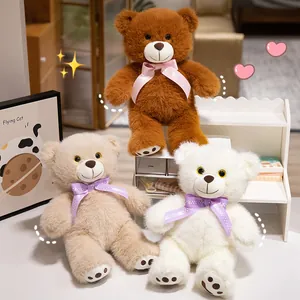 Set van drie schattige pluche teddyberen in bruin, beige en wit met decoratieve strikken