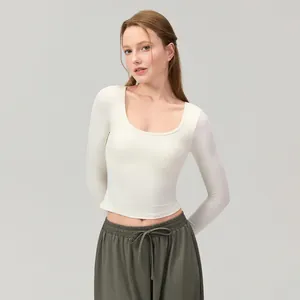 Professional slim fit long-sleeve yoga top in cream white with breathable fabric for fitness