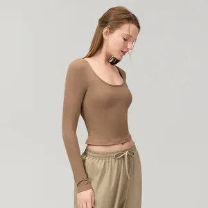 Women's slim fit long sleeve yoga top with U-neck in coffee brown for gym and running
