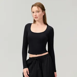 Professional slim fit black long sleeve yoga top with scoop neck for running and fitness