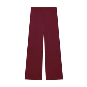 Detailed view of autumn wine red straight-leg suit trousers with clean silhouette