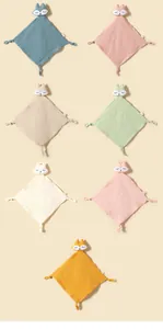 Detailed view of various colorful cotton gauze baby security blankets with cute fox heads