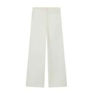 Clean macro view of cream-colored straight-leg dress trousers for women