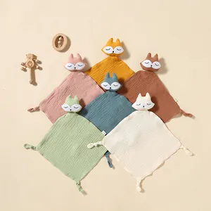 Collection of fox-shaped cotton muslin baby security blankets in various pastel colors