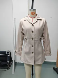 Detailed front view of a beige slim fit lapel woolen coat displayed on a mannequin.